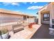 Cozy patio with comfortable seating, potted plants, and stylish decor, perfect for outdoor relaxation at 1057 Neil Armstrong Cir, Las Vegas, NV 89145