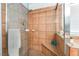 Close-up of tiled shower with glass door and built-in bench at 1057 Neil Armstrong Cir, Las Vegas, NV 89145