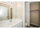 Bathroom featuring a single sink vanity and a closet at 1117 Coral Crystal Ct, North Las Vegas, NV 89032