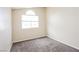 Bedroom featuring neutral carpeting and a bright window at 1117 Coral Crystal Ct, North Las Vegas, NV 89032