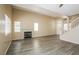 Open living room with high ceilings, a fireplace, and hardwood floors at 1117 Coral Crystal Ct, North Las Vegas, NV 89032