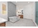 Beautiful bathroom featuring a standalone tub, modern fixtures, and stylish accents at 12844 New Providence St, Las Vegas, NV 89141