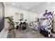 Versatile room with a large mirror, a drum set, and an abstract painting, perfect for creative pursuits at 12844 New Providence St, Las Vegas, NV 89141