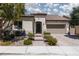 Charming single-story home with a well-manicured front yard and a two-car garage at 12844 New Providence St, Las Vegas, NV 89141