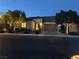 Charming single-story home showcasing the driveway, manicured front yard and inviting entrance at 12844 New Providence St, Las Vegas, NV 89141