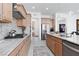 Spacious kitchen with stainless steel appliances, granite countertops, and gas cooktop at 12844 New Providence St, Las Vegas, NV 89141