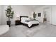 Relaxing main bedroom featuring soft colors, stylish bedside tables, and comfortable decor at 12844 New Providence St, Las Vegas, NV 89141