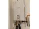 Image features a Rinnai tankless water heater installed indoors, displaying its compact design at 12844 New Providence St, Las Vegas, NV 89141