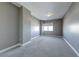 Bedroom with neutral gray walls and plush gray carpeting at 150 Las Vegas Blvd # 2016, North Las Vegas, NV 89101