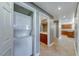 Hallway with laundry area, modern lighting, and easy access to the bathroom and kitchen at 150 Las Vegas Blvd # 2016, North Las Vegas, NV 89101