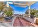 Relaxing outdoor patio with a built-in grill, prep area, and lush planters for privacy at 150 Las Vegas Blvd # 2016, North Las Vegas, NV 89101