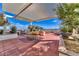 Inviting outdoor patio featuring a covered dining area and lush greenery with city views at 150 Las Vegas Blvd # 2016, North Las Vegas, NV 89101