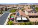 Aerial view of a home featuring a backyard with a pool, patio, and solar panels on the roof at 184 Cullerton St, Las Vegas, NV 89148