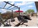 Cozy backyard featuring pergola, hot tub, fire pit, and outdoor seating area at 184 Cullerton St, Las Vegas, NV 89148
