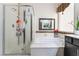 Bright bathroom showcasing a soaking tub and glass shower enclosure at 184 Cullerton St, Las Vegas, NV 89148