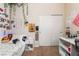 Cozy bedroom featuring a daybed, closet with sliding doors, neutral color carpet, and decoratively adorned walls at 184 Cullerton St, Las Vegas, NV 89148