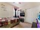 Inviting bedroom with a modern ceiling fan and a cozy bed at 184 Cullerton St, Las Vegas, NV 89148