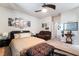 Spacious bedroom featuring a large bed, cozy seating, and elegant artwork at 184 Cullerton St, Las Vegas, NV 89148