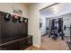 Inviting exercise room with weight rack, bench, and padded bench with storage at 184 Cullerton St, Las Vegas, NV 89148