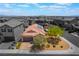 Exterior elevation of a charming two-story home with a well-manicured front yard and inviting curb appeal at 184 Cullerton St, Las Vegas, NV 89148