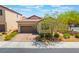 Charming single-story home with a two-car garage and well-manicured landscaping for great curb appeal at 184 Cullerton St, Las Vegas, NV 89148