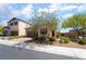 Charming two-story home featuring a well-maintained front yard and a neutral color scheme, offering great curb appeal at 184 Cullerton St, Las Vegas, NV 89148