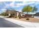 A charming single-story home with a well-manicured front yard featuring desert landscaping at 184 Cullerton St, Las Vegas, NV 89148