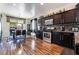Dark cabinets, granite countertops, and stainless steel appliances combine to create a stylish kitchen at 184 Cullerton St, Las Vegas, NV 89148