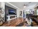 Bright living room featuring hardwood floors, a modern fireplace, and stylish furnishings offer a cozy atmosphere at 184 Cullerton St, Las Vegas, NV 89148
