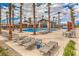 Resort-style pool area with plenty of lounge chairs for relaxing in the sun at 2114 Thelen Ave, North Las Vegas, NV 89086