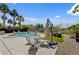 Outdoor dining and lounge seating provide ample room for relaxing around the pool at 2117 Mountain Rail Dr, North Las Vegas, NV 89084