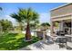 Backyard boasts outdoor kitchen, lounge area and pool at 2117 Mountain Rail Dr, North Las Vegas, NV 89084