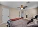 Bedroom with ceiling fan and views into another bedroom at 2117 Mountain Rail Dr, North Las Vegas, NV 89084