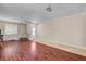 Spacious living room with hardwood floors, bright lighting, and ample space for relaxing and entertaining at 2117 Mountain Rail Dr, North Las Vegas, NV 89084