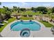 Backyard oasis with pool, spa and manicured lawn at 2117 Mountain Rail Dr, North Las Vegas, NV 89084
