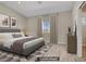 Cozy bedroom with a comfortable bed, neutral decor, and ample natural light at 2130 Revere St, North Las Vegas, NV 89030