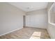 Neutral bedroom featuring a closet, neutral walls, and wood-style flooring at 2130 Revere St, North Las Vegas, NV 89030