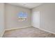 Bedroom with natural light, wood-style flooring, and a closet at 2130 Revere St, North Las Vegas, NV 89030