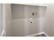 Interior view of a laundry room with shelving and utilities at 2130 Revere St, North Las Vegas, NV 89030