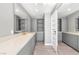 Large bathroom vanity has ample counter space, cabinet storage, and a modern, minimalist design at 2204 Plaza De La Candela, Las Vegas, NV 89102