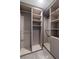 Spacious closet with built-in shelving and hanging rods for optimal storage organization at 2204 Plaza De La Candela, Las Vegas, NV 89102