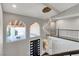 Grand entryway featuring high ceilings, a modern chandelier, and arched windows at 2204 Plaza De La Candela, Las Vegas, NV 89102