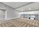 An upstairs loft space features neutral carpet, and balcony overlooking the staircase and entryway at 2204 Plaza De La Candela, Las Vegas, NV 89102