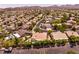 Wide aerial shot of a community showcasing diverse homes, mature trees, and well-kept landscapes at 2547 Serenity Hollow Dr, Henderson, NV 89052