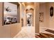 Hallway view showcasing the tile flooring, archways, and open concept at 2547 Serenity Hollow Dr, Henderson, NV 89052