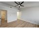 Bedroom with a ceiling fan and entryways to an ensuite bathroom and closet at 2725 S Nellis Blvd # 2036, Las Vegas, NV 89121
