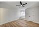 Bright bedroom features wood-look floors, a ceiling fan, and a window seat at 2725 S Nellis Blvd # 2036, Las Vegas, NV 89121