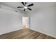 Large bedroom featuring stylish flooring and an adjacent ensuite bathroom entrance at 2725 S Nellis Blvd # 2036, Las Vegas, NV 89121