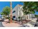 Charming building exterior with mature landscaping, lush trees, and sidewalks at 2725 S Nellis Blvd # 2036, Las Vegas, NV 89121