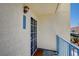 Inviting entryway with a security door and a view of the building's architecture at 2725 S Nellis Blvd # 2036, Las Vegas, NV 89121